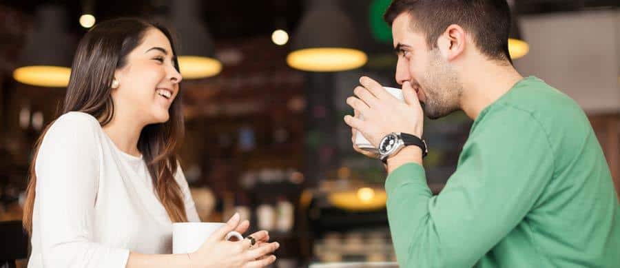 old friends chatting at a coffee shop