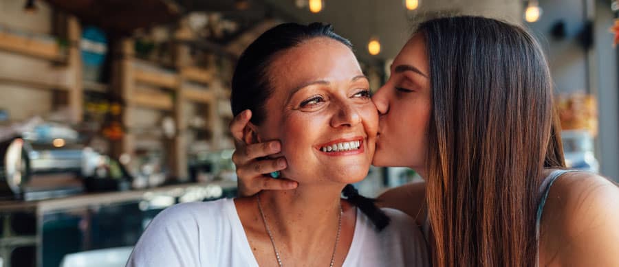 daughter celebrating mother's day with her mother