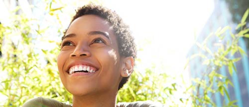 happy woman smiling outside