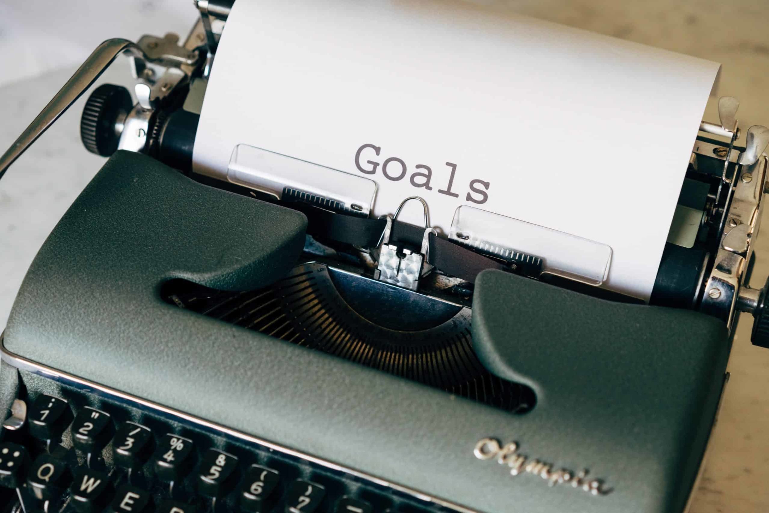 Typewriter with the word 'goals.'