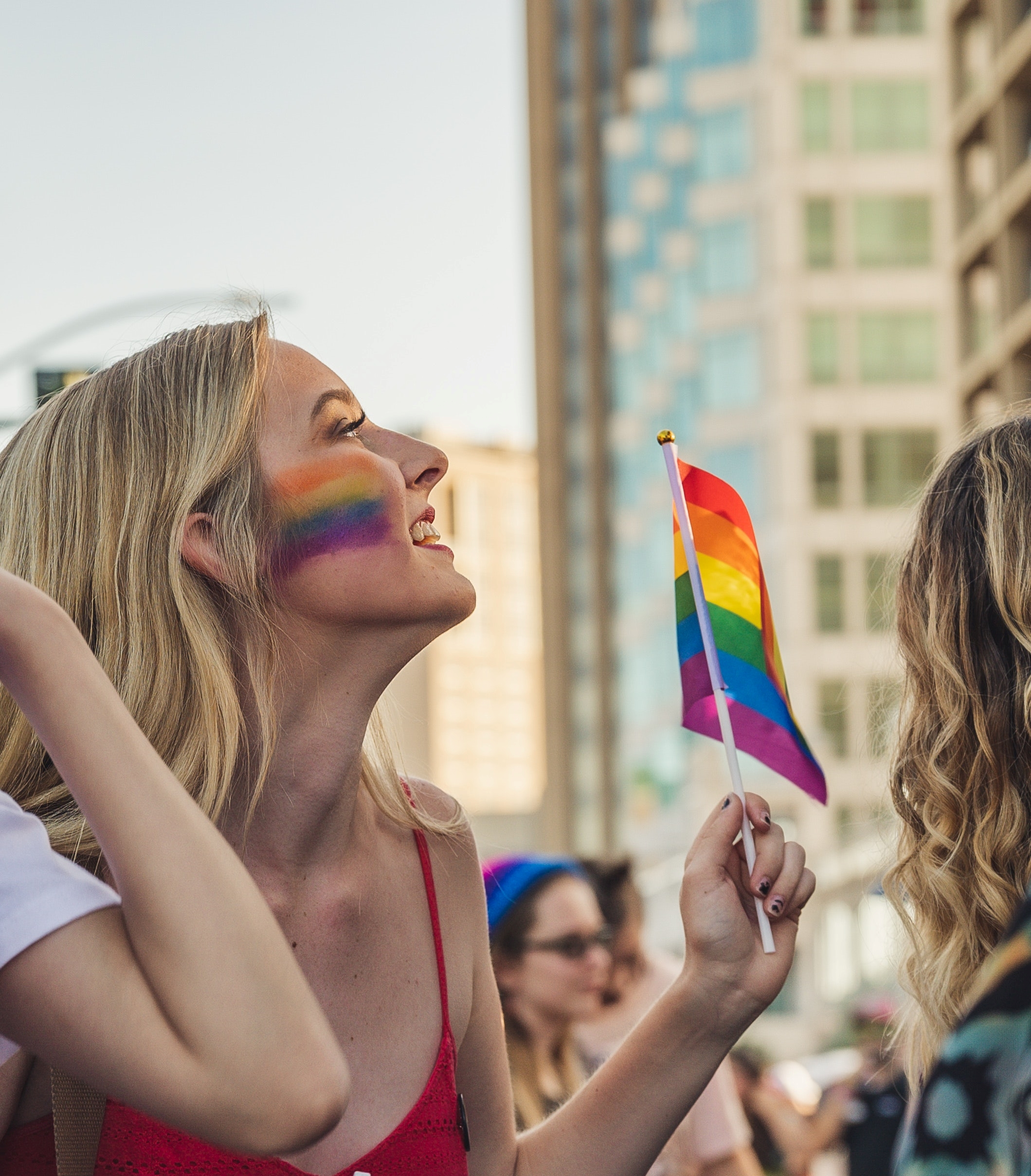 A sober woman celebrating during Pride Month.